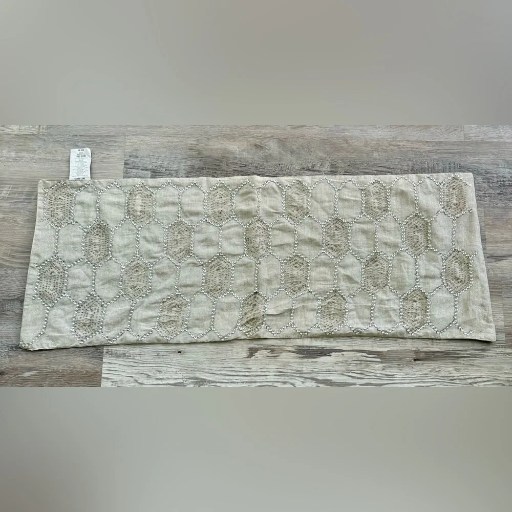 Pier 1 Imports taupe table runner with embroidered hexagon pattern